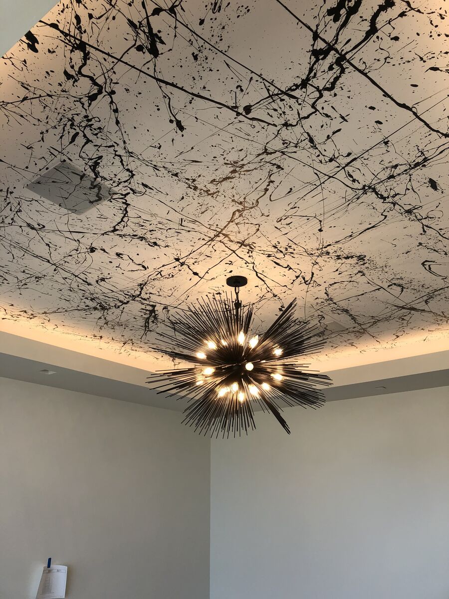 Black and white splatter-paint decorative accent wall