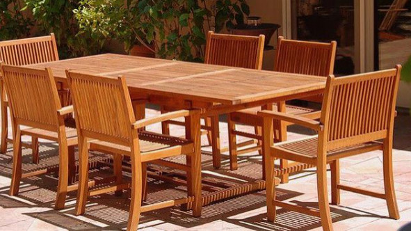 Refinished teak outdoor dining table and chairs